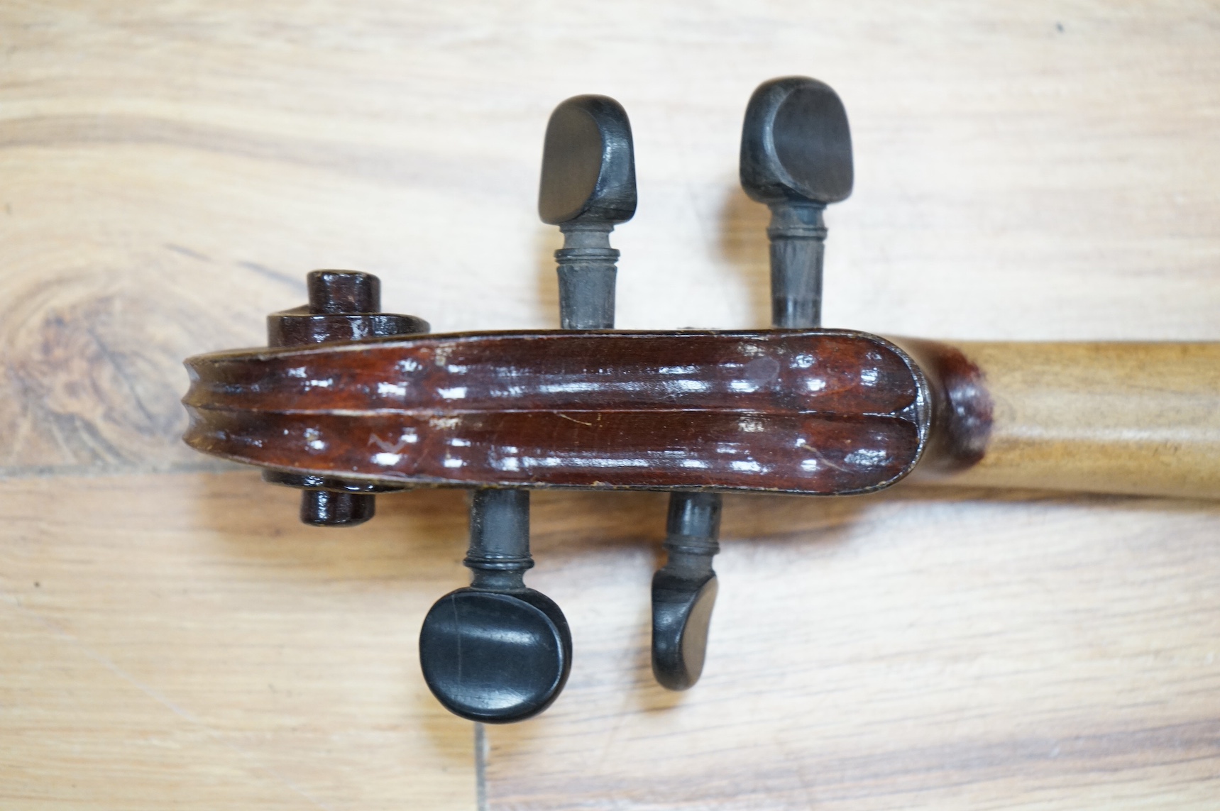 A cased violin, label to interior reads ‘Dulcis et Fortis’, back 36cm. Condition - scratches